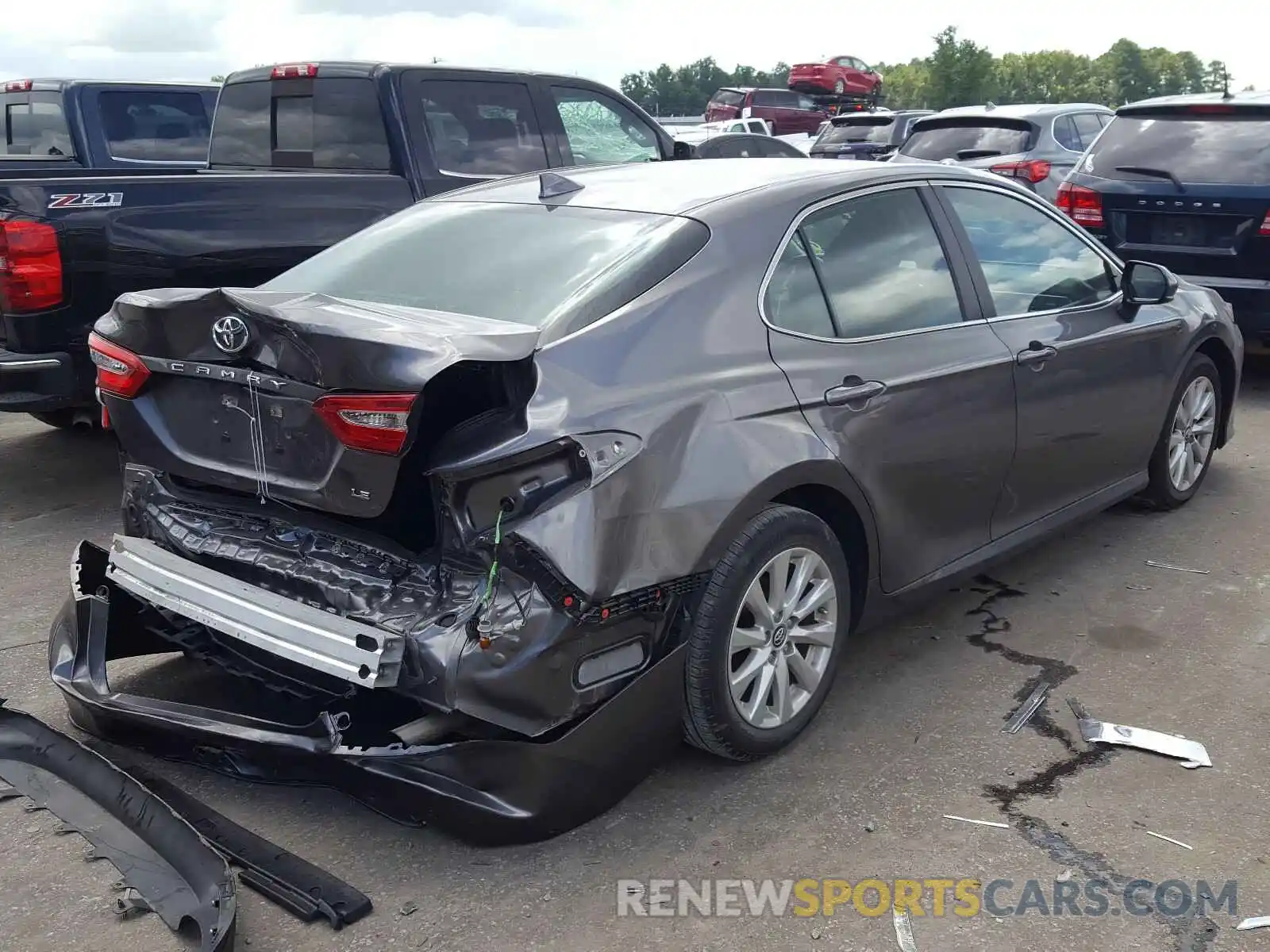 4 Photograph of a damaged car 4T1B11HK9KU785563 TOYOTA CAMRY 2019