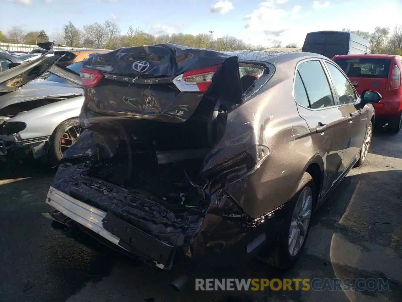 4 Photograph of a damaged car 4T1B11HK9KU786079 TOYOTA CAMRY 2019