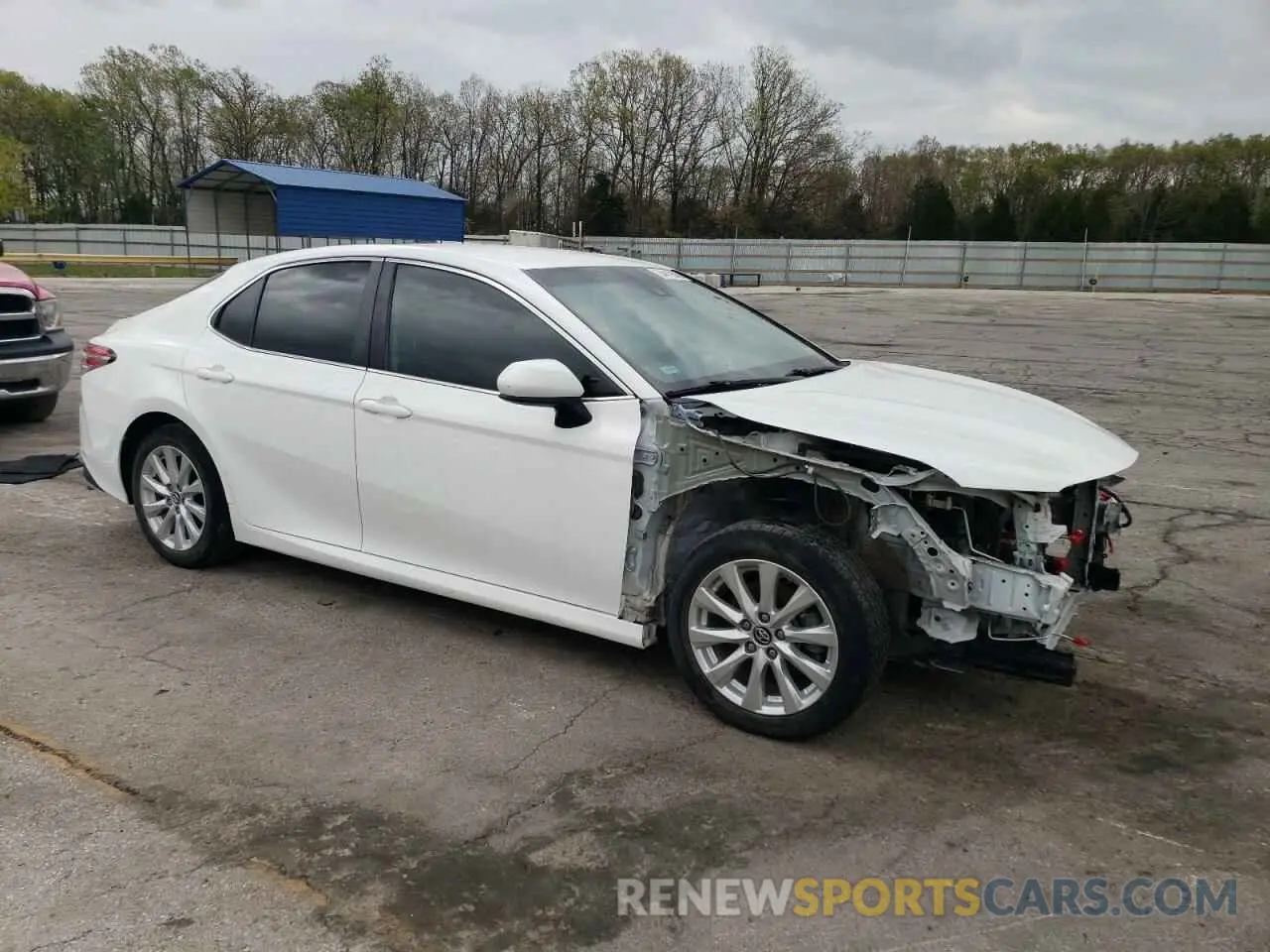4 Photograph of a damaged car 4T1B11HK9KU811823 TOYOTA CAMRY 2019