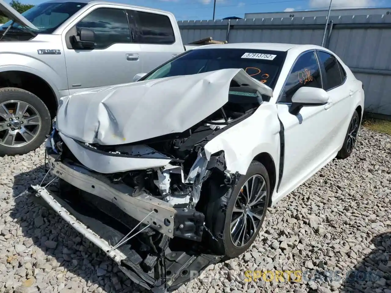 2 Photograph of a damaged car 4T1B11HK9KU853621 TOYOTA CAMRY 2019