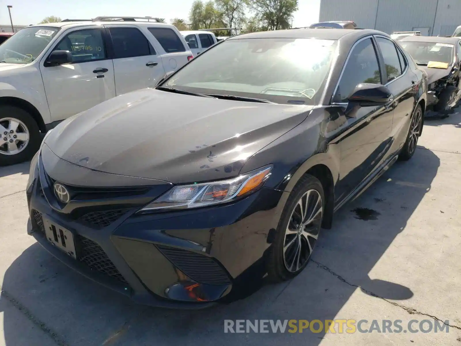 2 Photograph of a damaged car 4T1B11HKXKU163067 TOYOTA CAMRY 2019