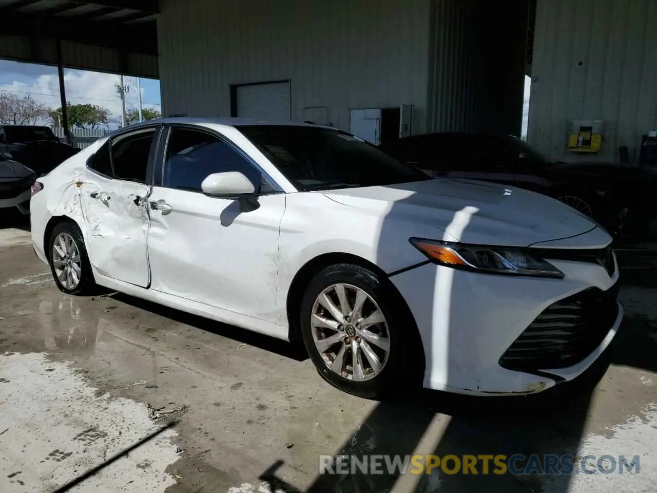 4 Photograph of a damaged car 4T1B11HKXKU179320 TOYOTA CAMRY 2019