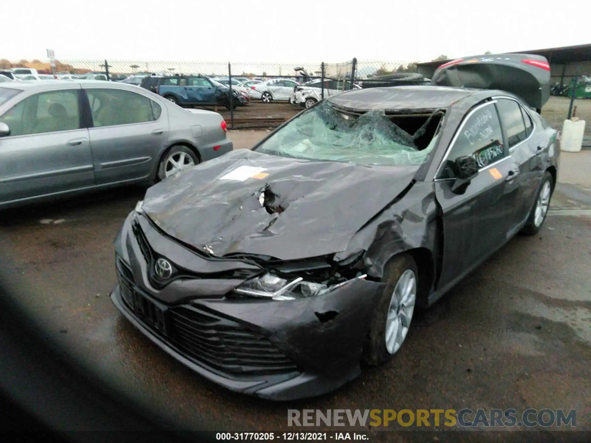 2 Photograph of a damaged car 4T1B11HKXKU195680 TOYOTA CAMRY 2019