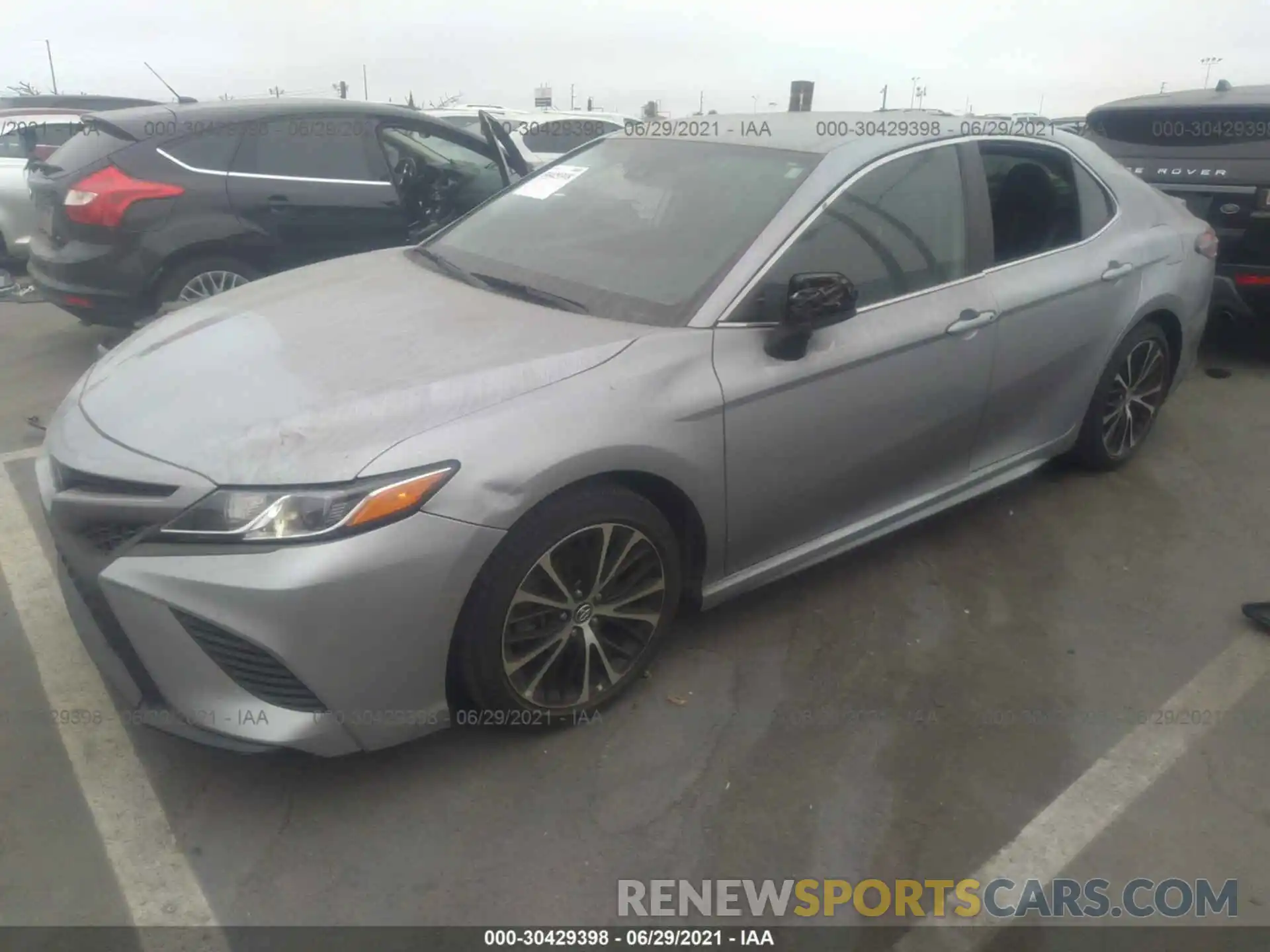 2 Photograph of a damaged car 4T1B11HKXKU209898 TOYOTA CAMRY 2019