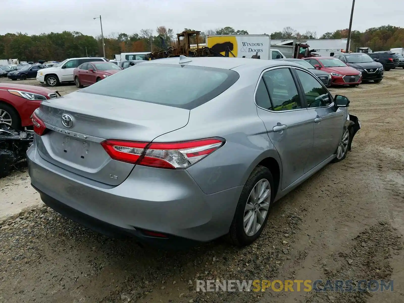 4 Photograph of a damaged car 4T1B11HKXKU230380 TOYOTA CAMRY 2019