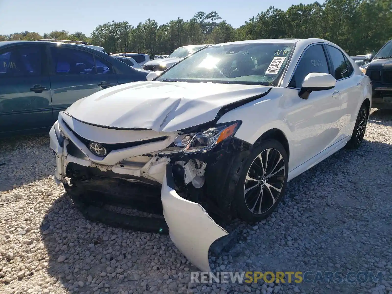 2 Photograph of a damaged car 4T1B11HKXKU230654 TOYOTA CAMRY 2019