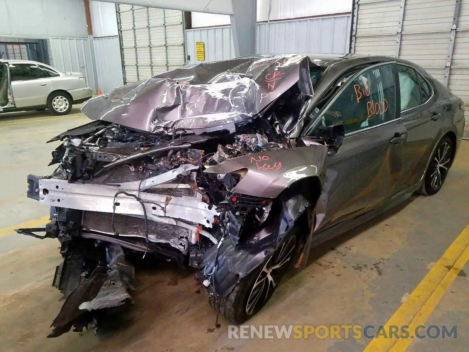 2 Photograph of a damaged car 4T1B11HKXKU231979 TOYOTA CAMRY 2019