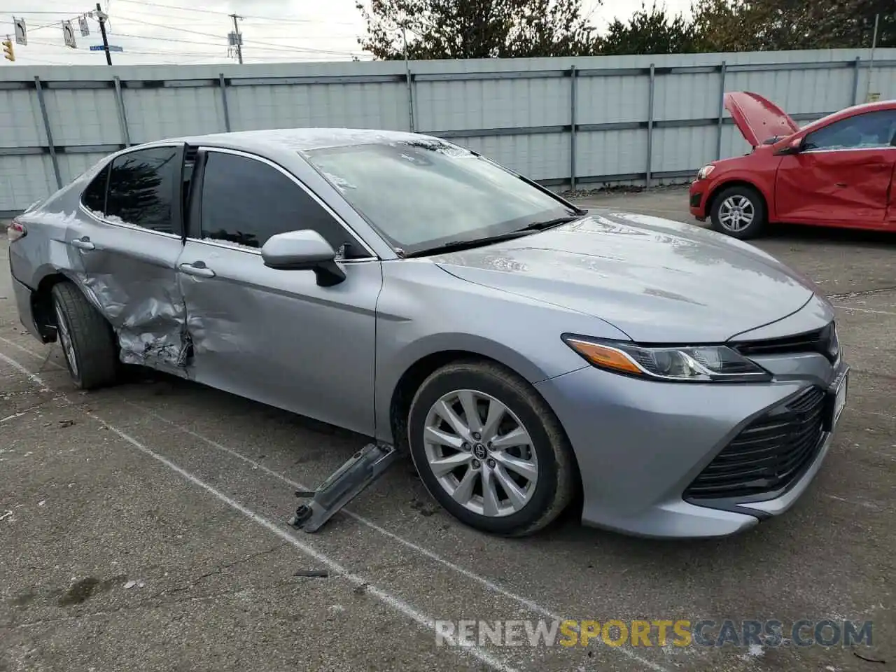 4 Photograph of a damaged car 4T1B11HKXKU233361 TOYOTA CAMRY 2019