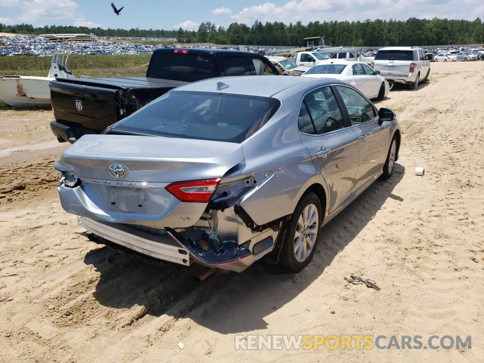 4 Photograph of a damaged car 4T1B11HKXKU240844 TOYOTA CAMRY 2019
