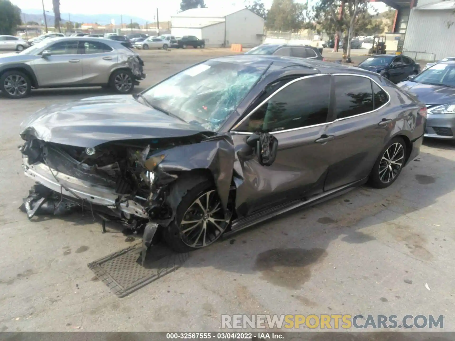 2 Photograph of a damaged car 4T1B11HKXKU265677 TOYOTA CAMRY 2019