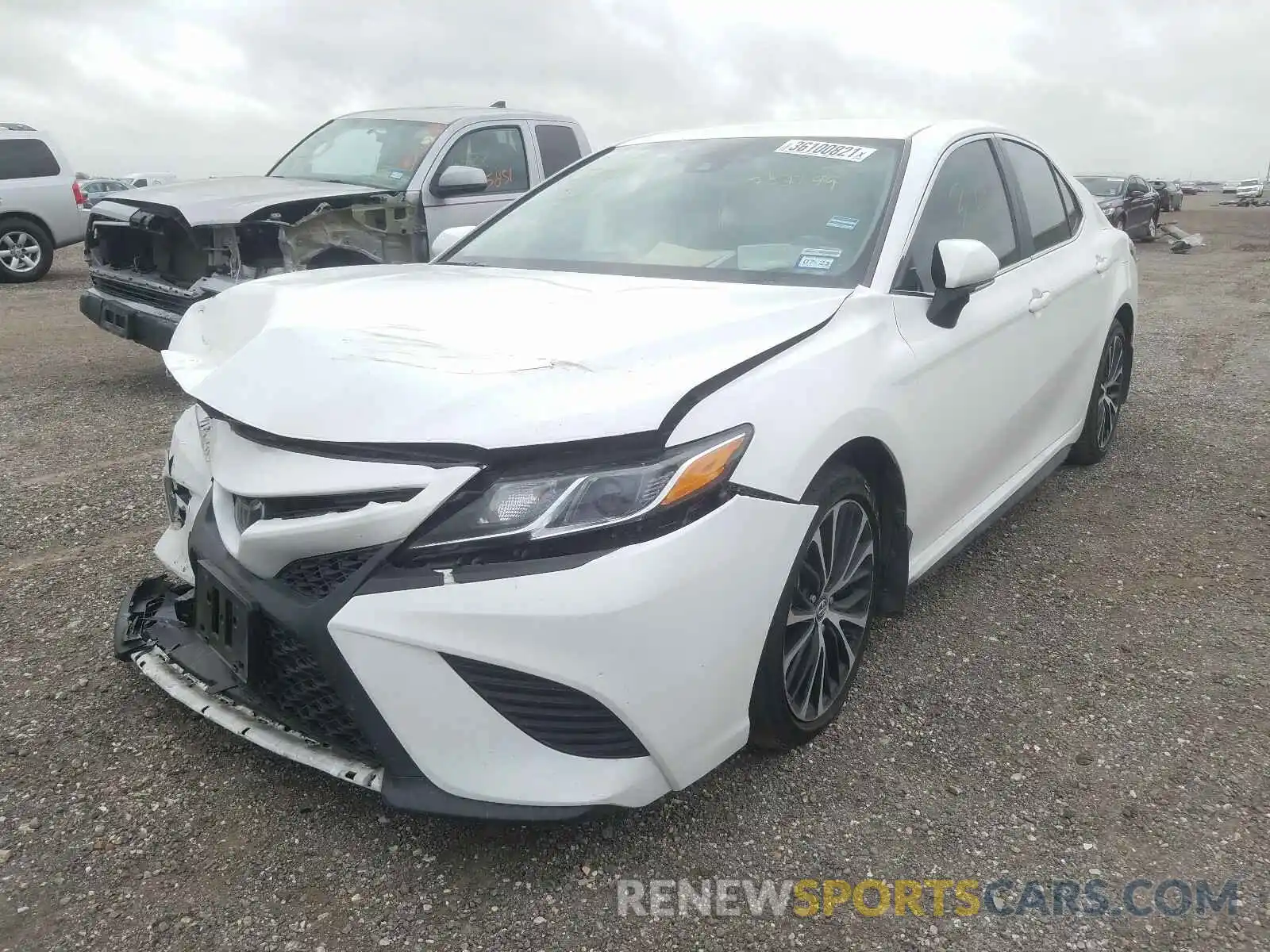 2 Photograph of a damaged car 4T1B11HKXKU282799 TOYOTA CAMRY 2019