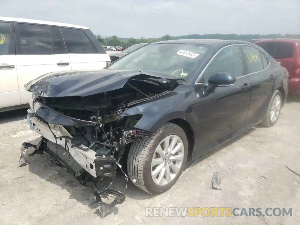 2 Photograph of a damaged car 4T1B11HKXKU291230 TOYOTA CAMRY 2019