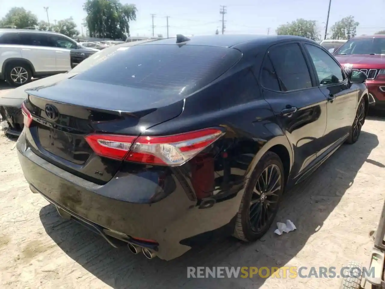 4 Photograph of a damaged car 4T1B11HKXKU297061 TOYOTA CAMRY 2019