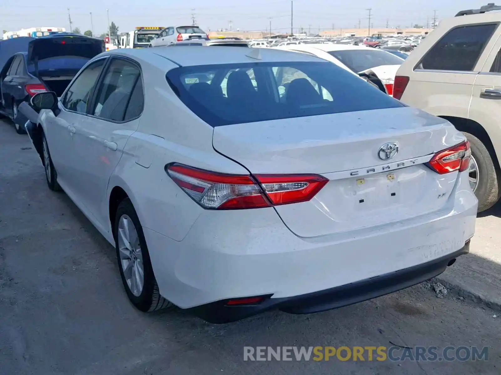 3 Photograph of a damaged car 4T1B11HKXKU690462 TOYOTA CAMRY 2019