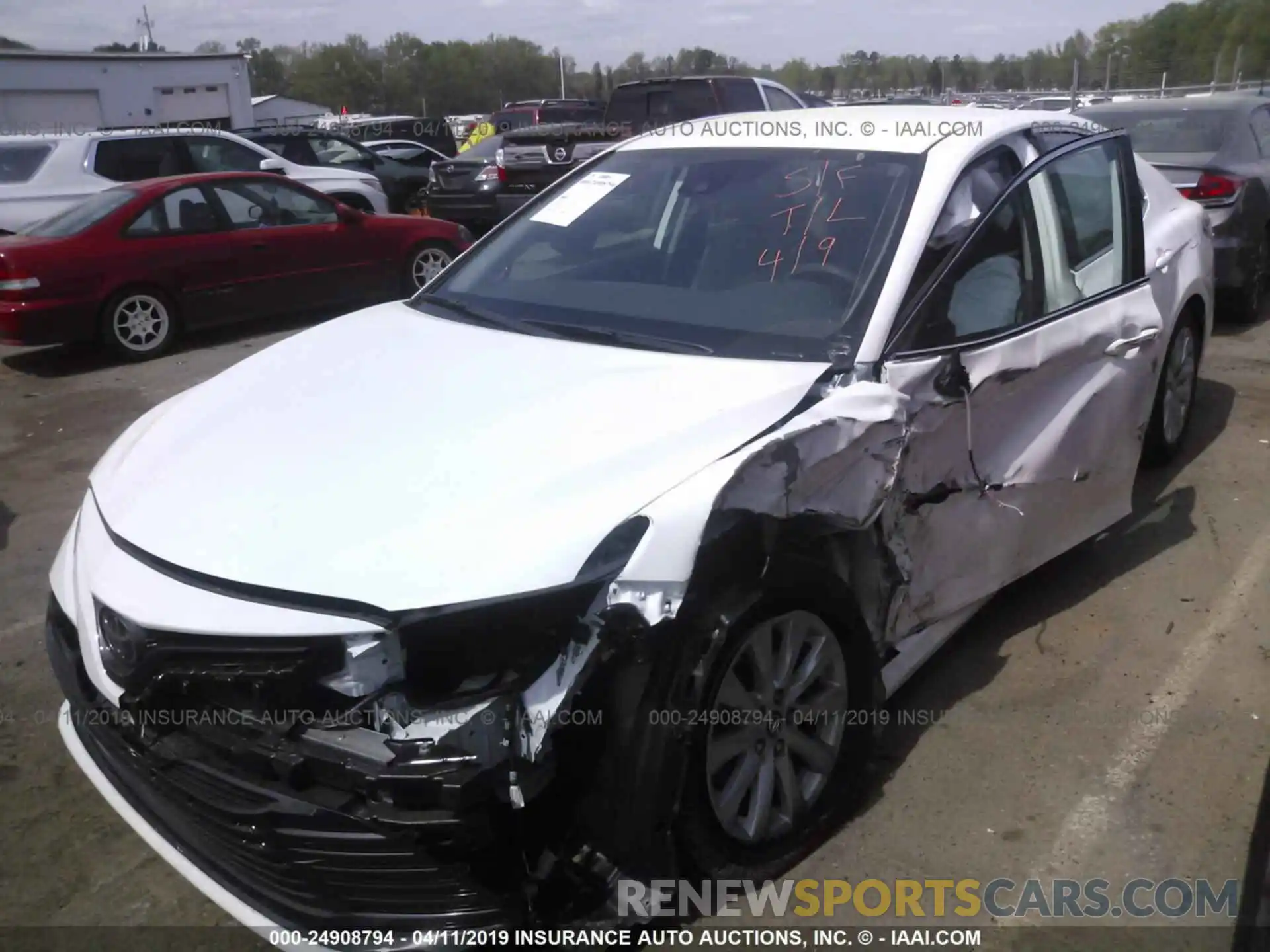 2 Photograph of a damaged car 4T1B11HKXKU690977 TOYOTA CAMRY 2019