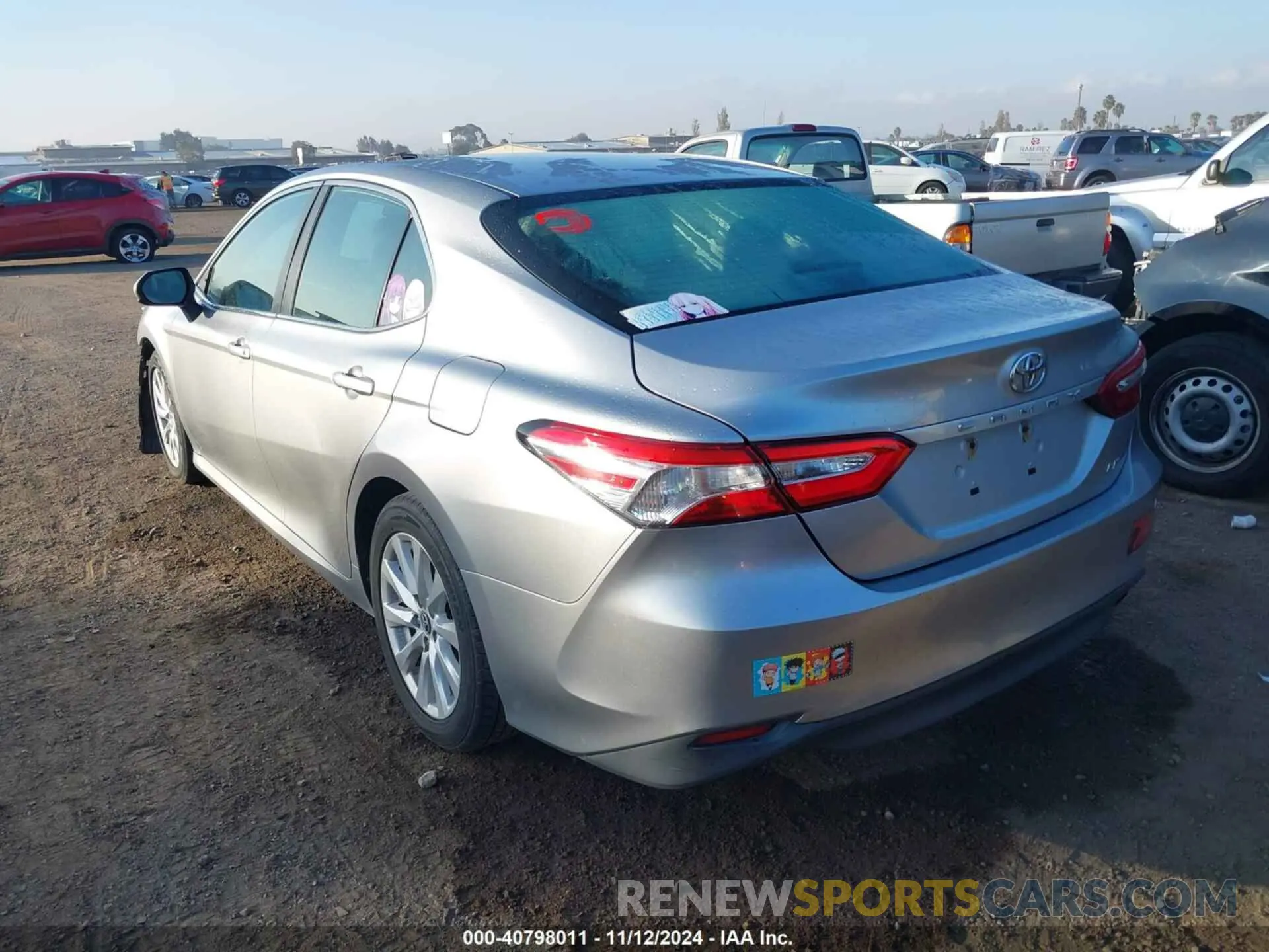 3 Photograph of a damaged car 4T1B11HKXKU696763 TOYOTA CAMRY 2019