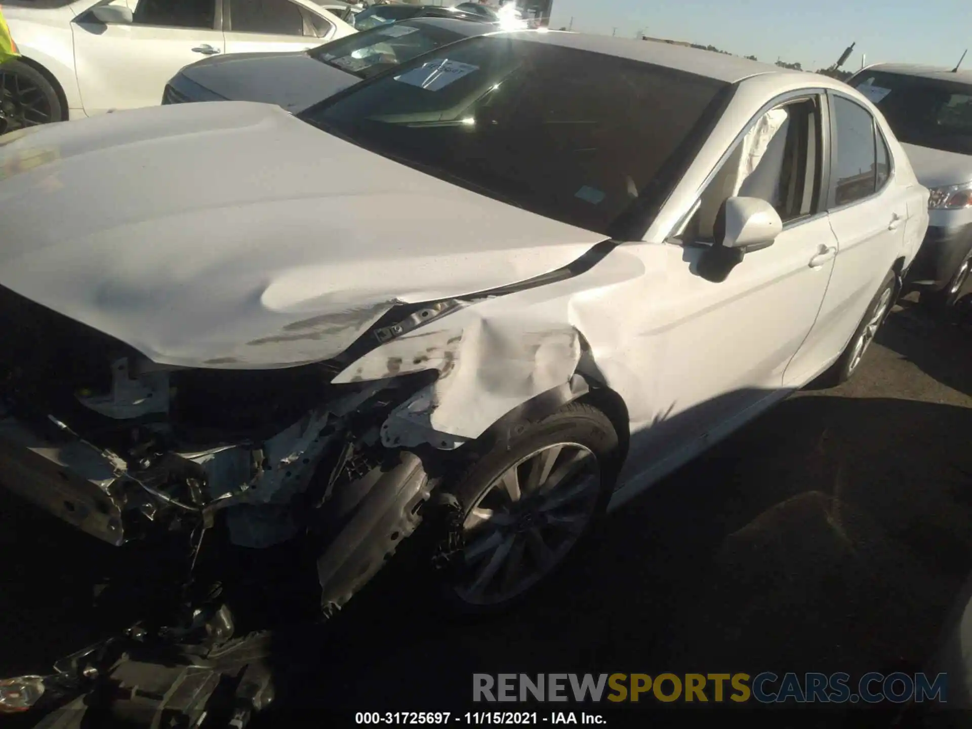 2 Photograph of a damaged car 4T1B11HKXKU697752 TOYOTA CAMRY 2019