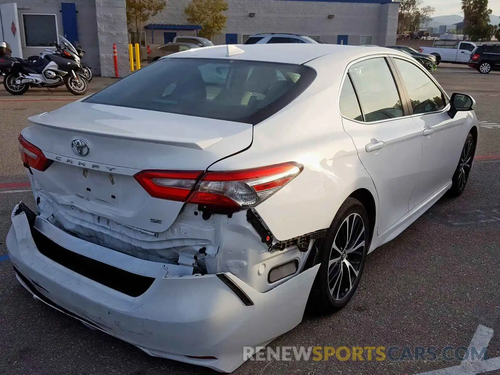 4 Photograph of a damaged car 4T1B11HKXKU698156 TOYOTA CAMRY 2019