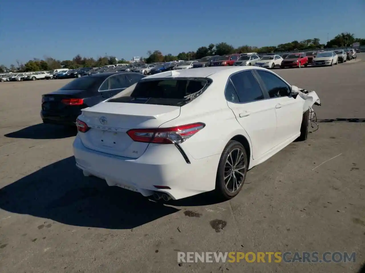 4 Photograph of a damaged car 4T1B11HKXKU698304 TOYOTA CAMRY 2019