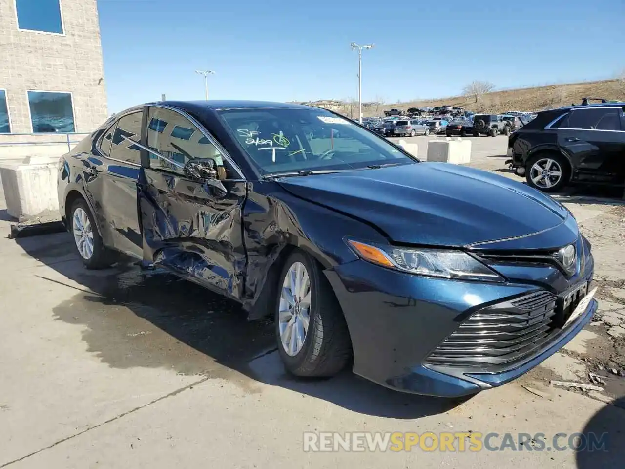 4 Photograph of a damaged car 4T1B11HKXKU700875 TOYOTA CAMRY 2019