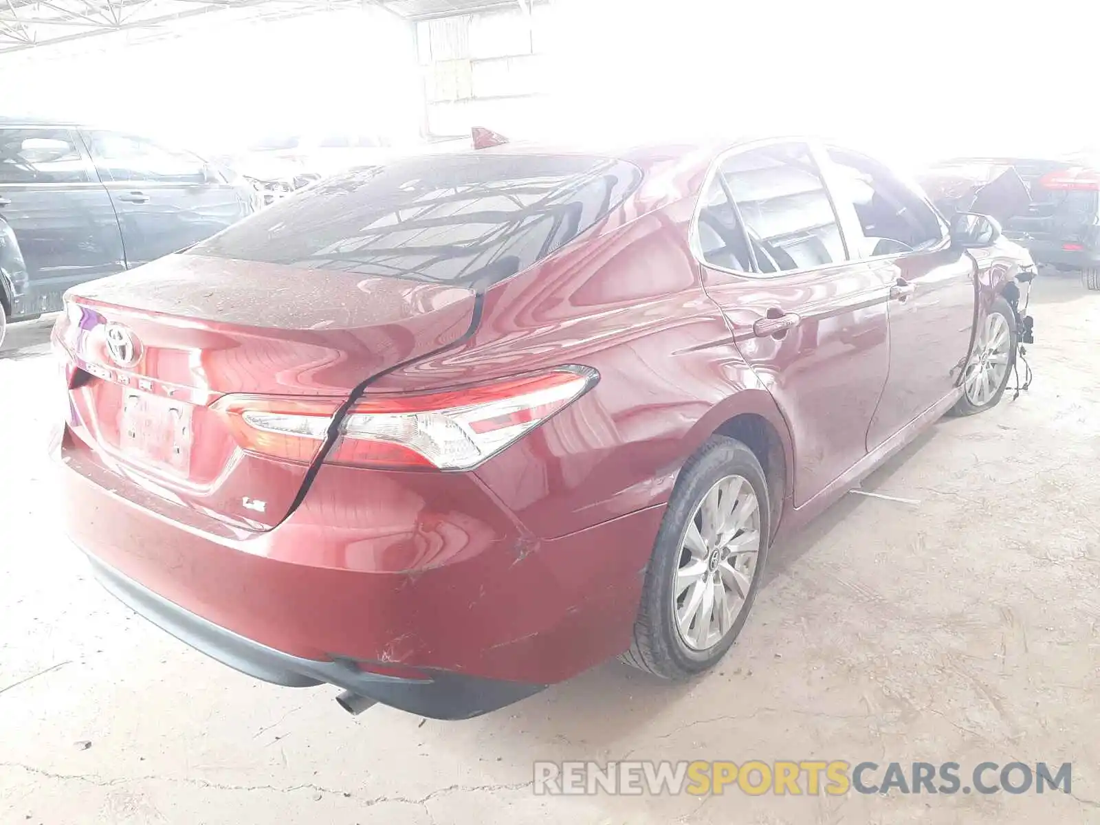 4 Photograph of a damaged car 4T1B11HKXKU704506 TOYOTA CAMRY 2019