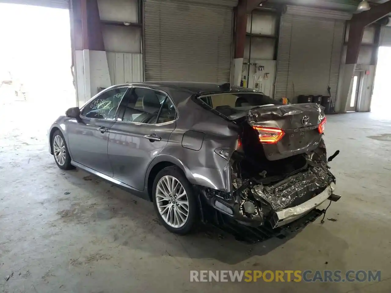 3 Photograph of a damaged car 4T1B11HKXKU705218 TOYOTA CAMRY 2019