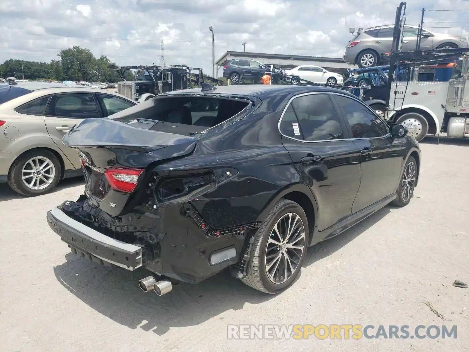 4 Photograph of a damaged car 4T1B11HKXKU708961 TOYOTA CAMRY 2019