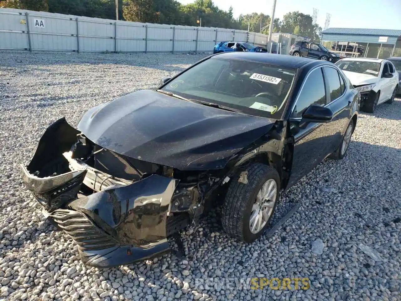 2 Photograph of a damaged car 4T1B11HKXKU719930 TOYOTA CAMRY 2019