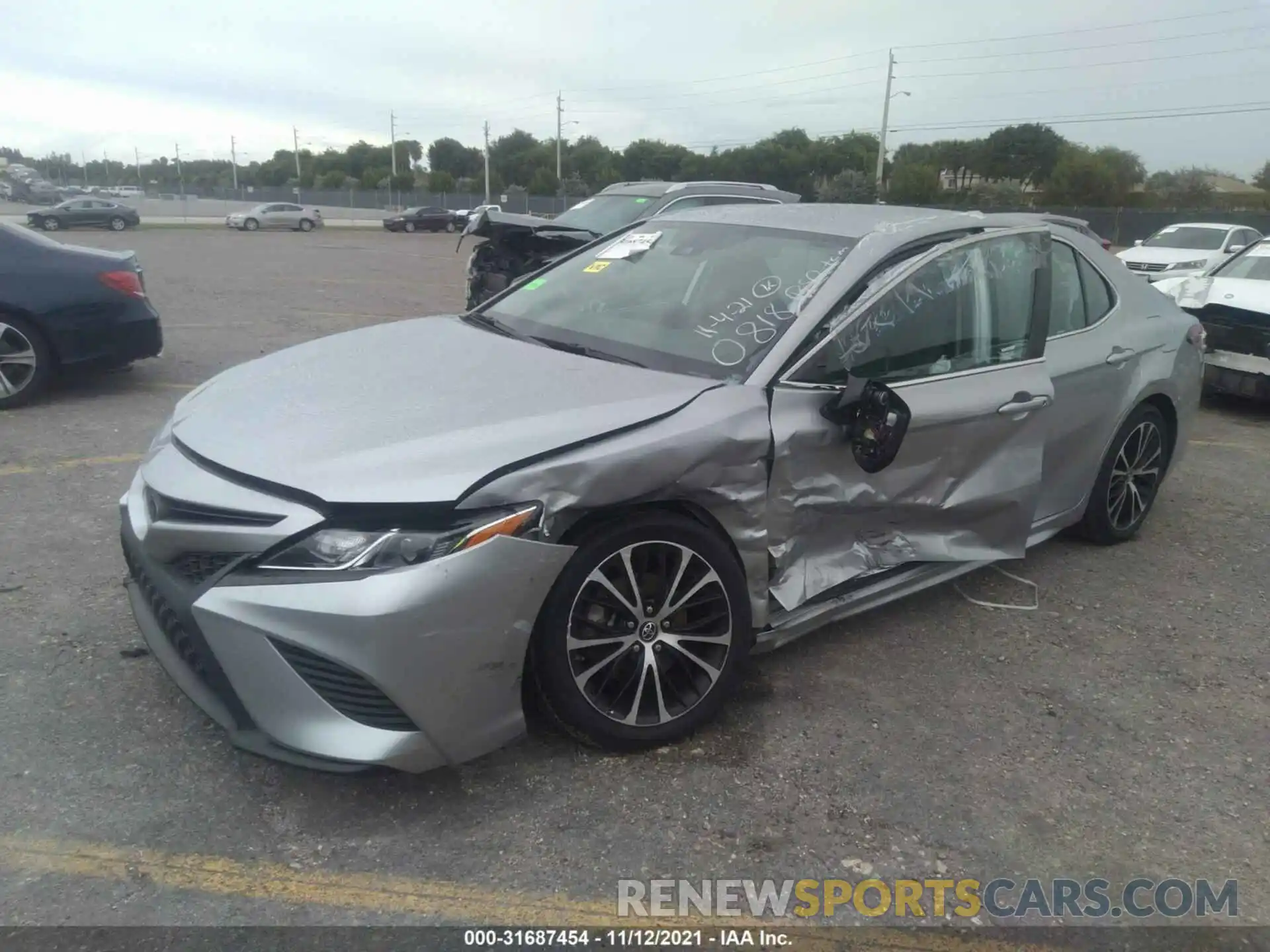 2 Photograph of a damaged car 4T1B11HKXKU720818 TOYOTA CAMRY 2019