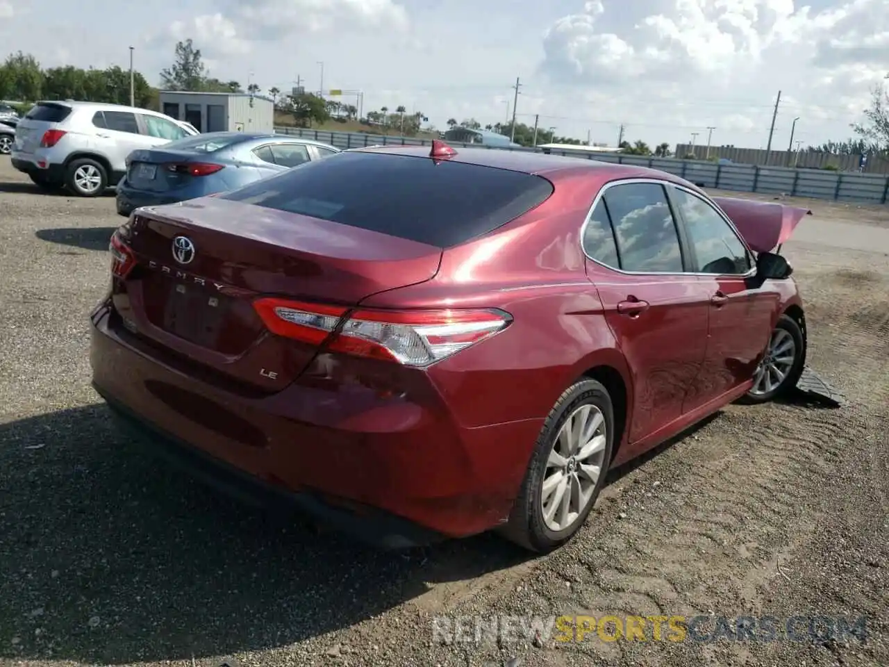 4 Photograph of a damaged car 4T1B11HKXKU739403 TOYOTA CAMRY 2019