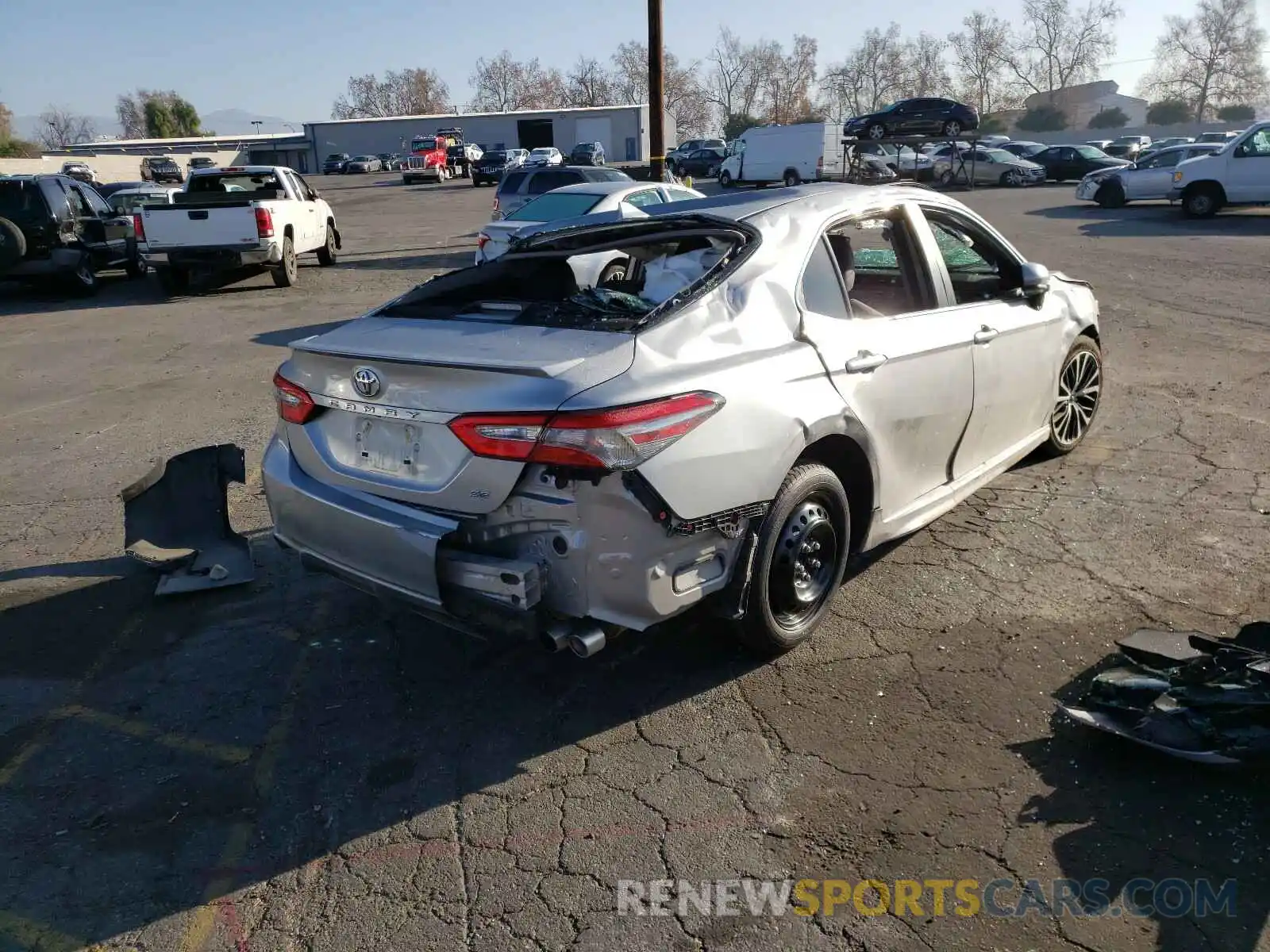 4 Photograph of a damaged car 4T1B11HKXKU741894 TOYOTA CAMRY 2019