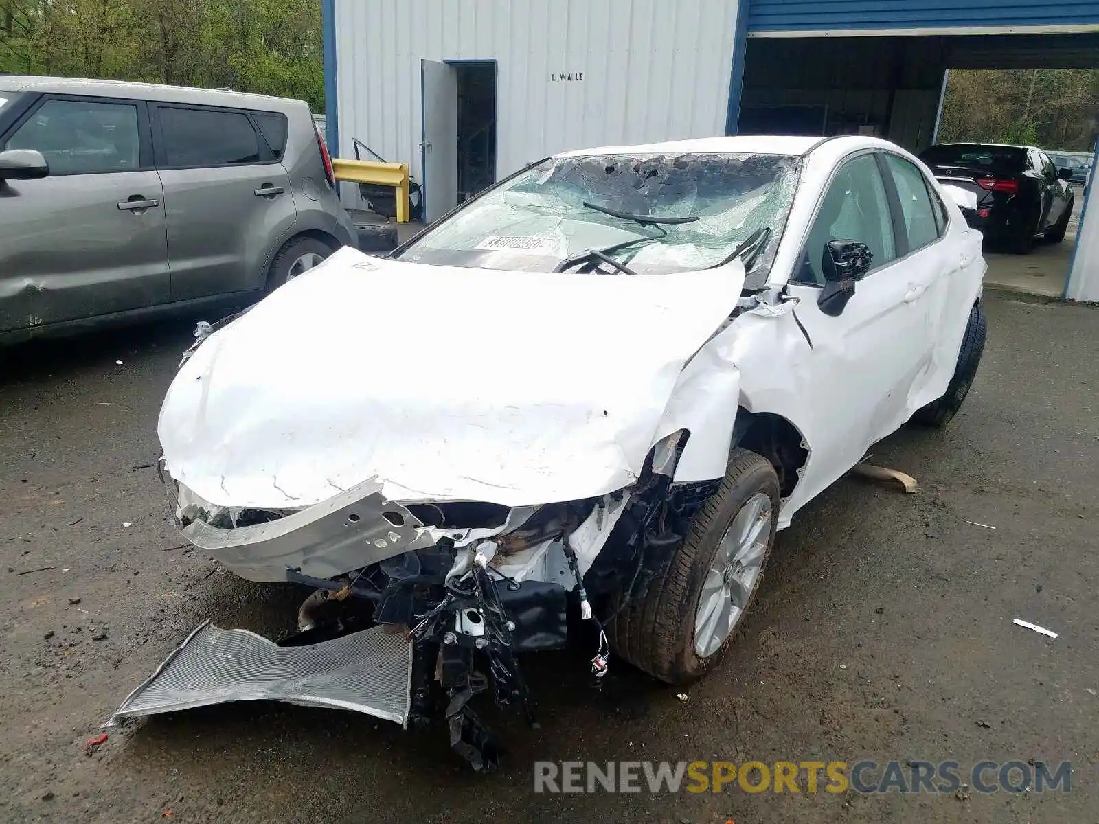 2 Photograph of a damaged car 4T1B11HKXKU758906 TOYOTA CAMRY 2019