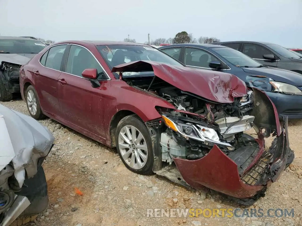 4 Photograph of a damaged car 4T1B11HKXKU779304 TOYOTA CAMRY 2019
