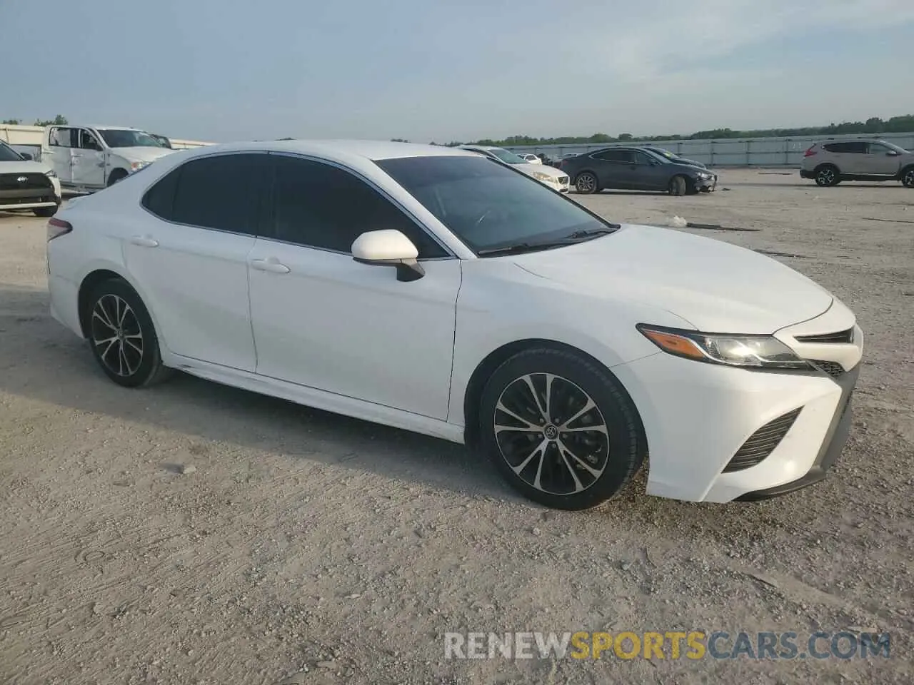 4 Photograph of a damaged car 4T1B11HKXKU779657 TOYOTA CAMRY 2019