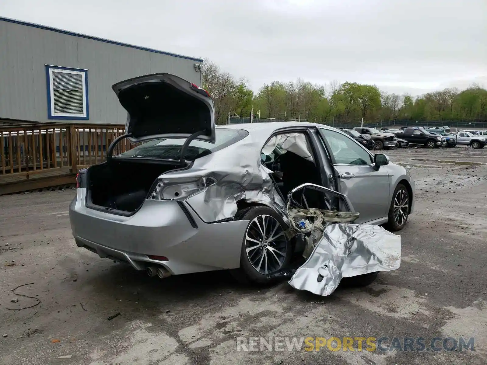 4 Photograph of a damaged car 4T1B11HKXKU779903 TOYOTA CAMRY 2019