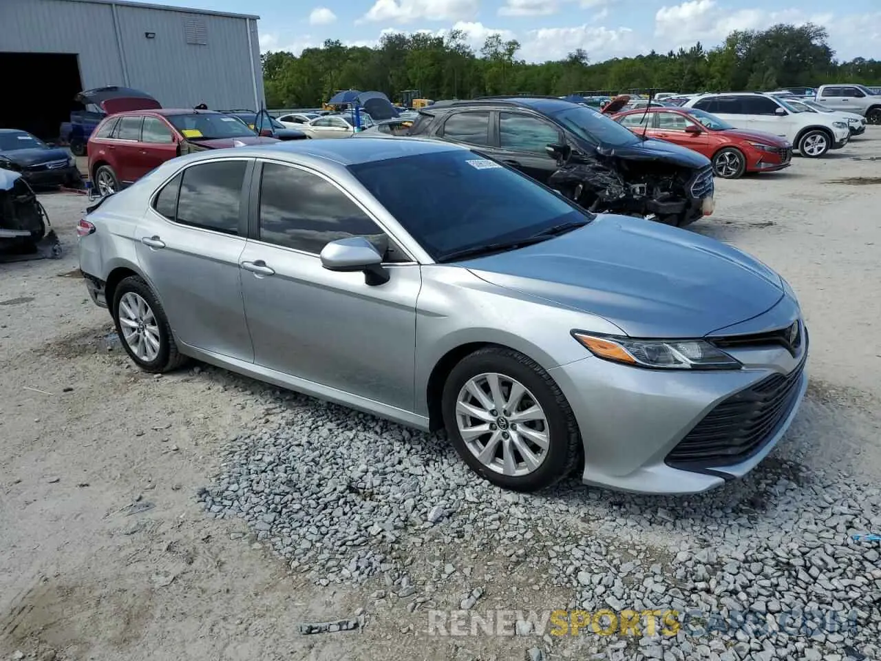 4 Photograph of a damaged car 4T1B11HKXKU799245 TOYOTA CAMRY 2019
