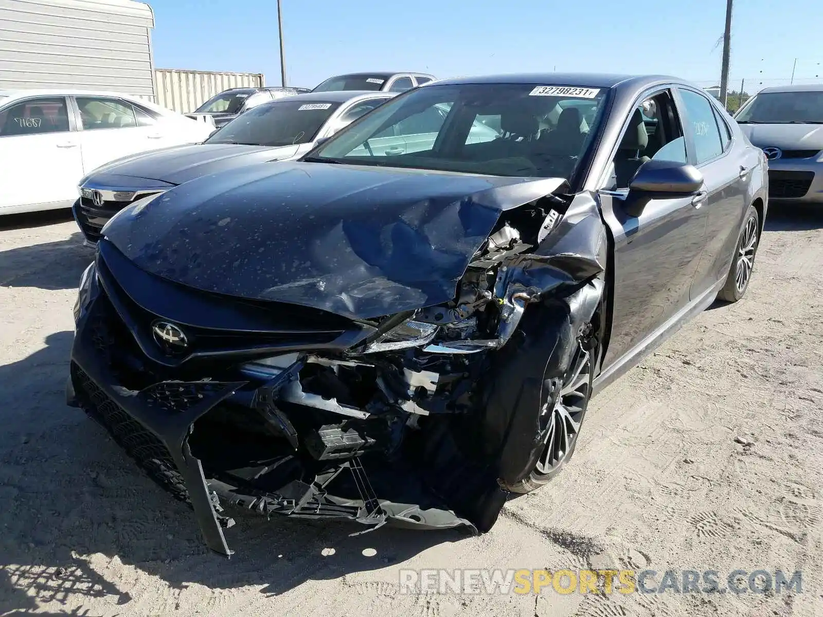 2 Photograph of a damaged car 4T1B11HKXKU803813 TOYOTA CAMRY 2019