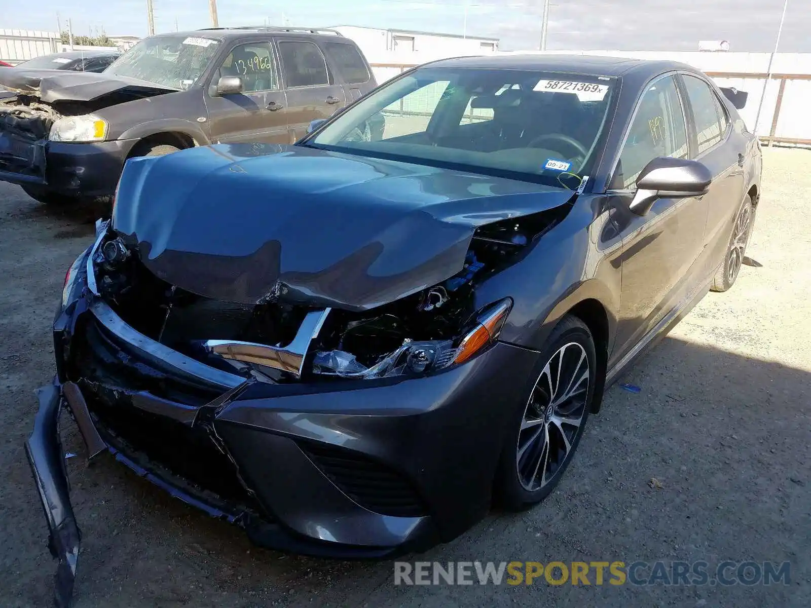 2 Photograph of a damaged car 4T1B11HKXKU812415 TOYOTA CAMRY 2019