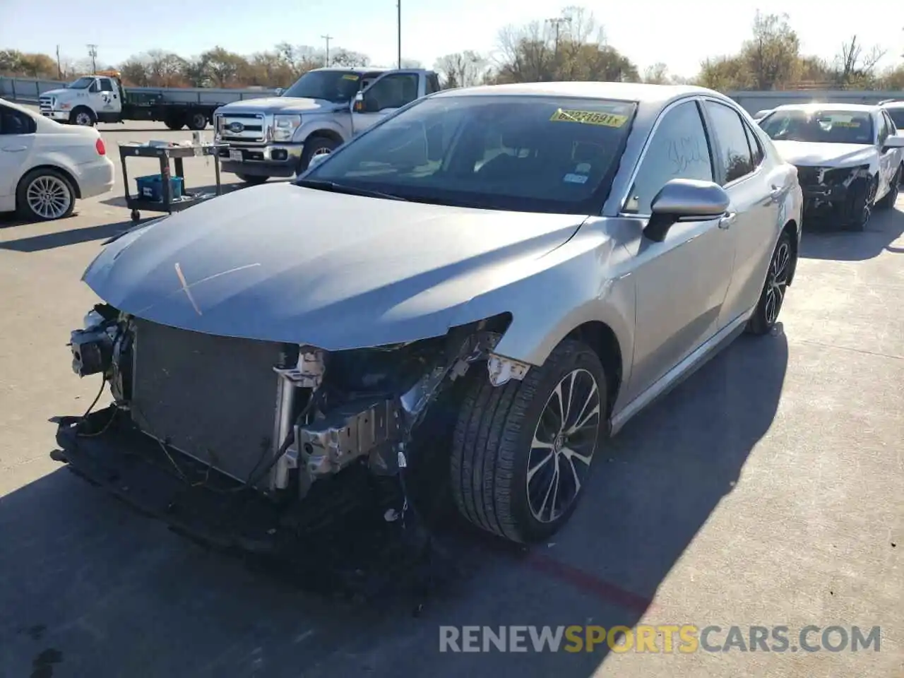 2 Photograph of a damaged car 4T1B11HKXKU814021 TOYOTA CAMRY 2019