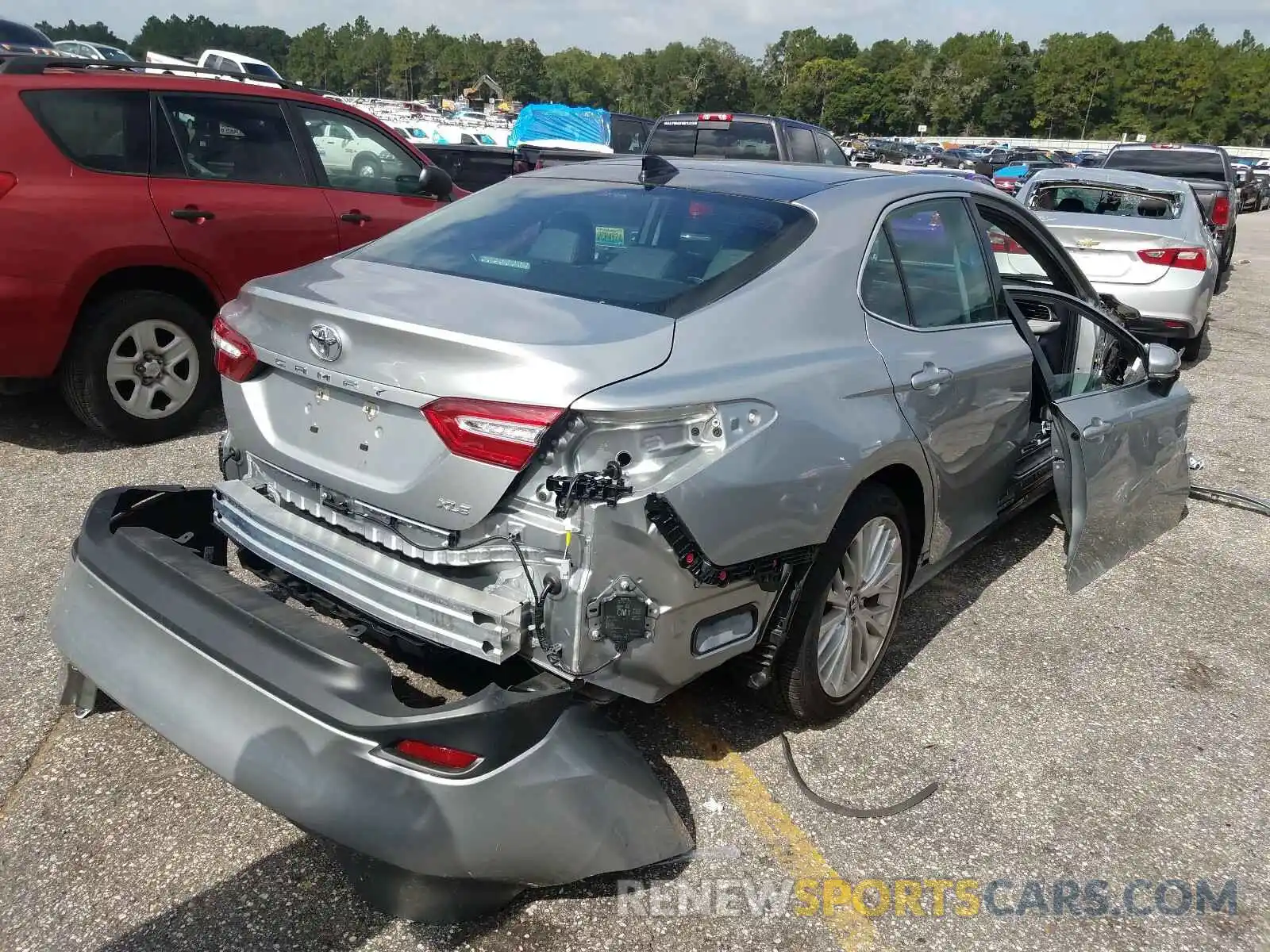 4 Photograph of a damaged car 4T1B11HKXKU814861 TOYOTA CAMRY 2019