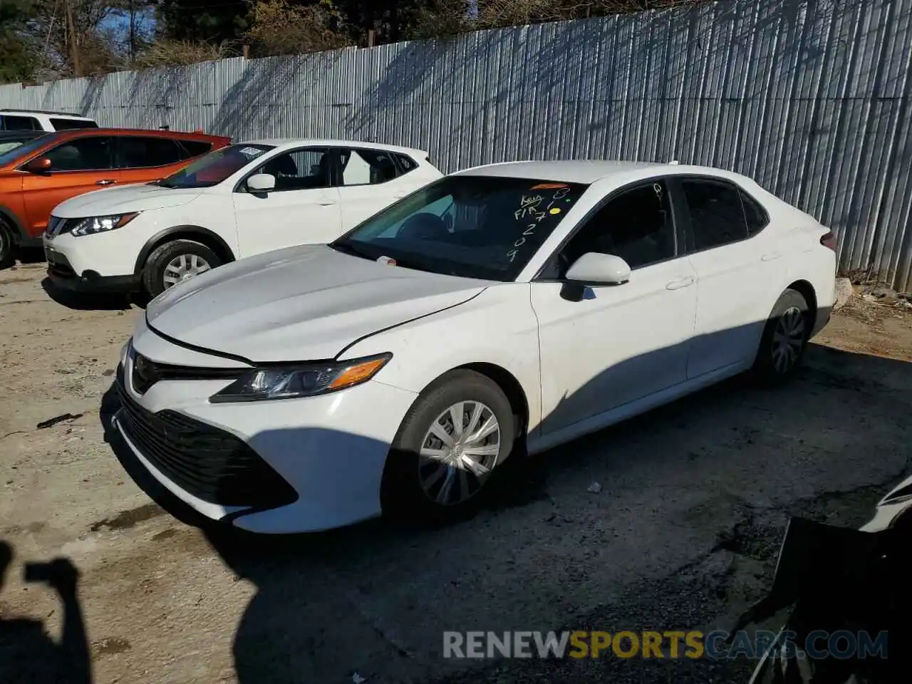 1 Photograph of a damaged car 4T1B11HKXKU817209 TOYOTA CAMRY 2019