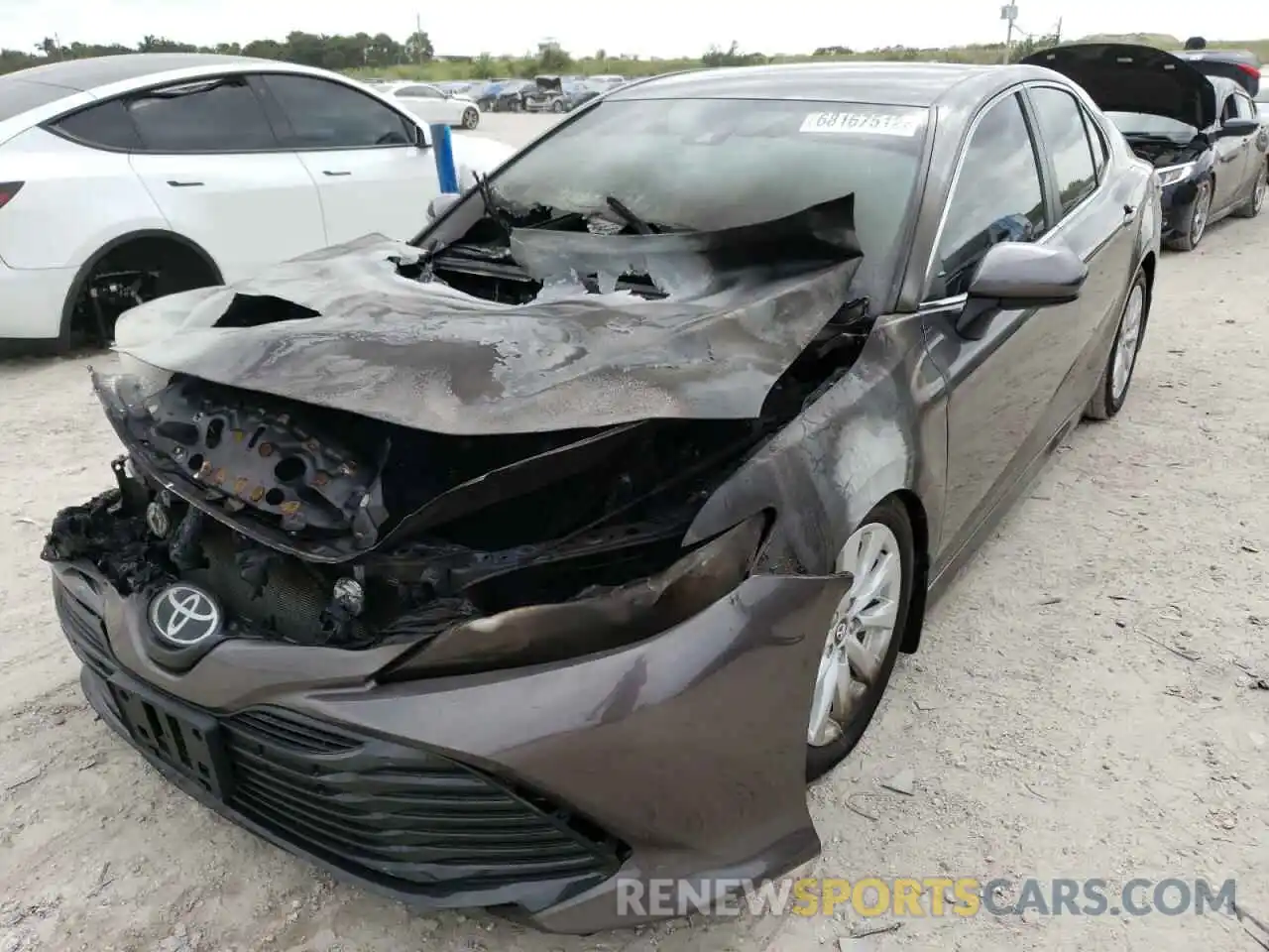 1 Photograph of a damaged car 4T1B11HKXKU823009 TOYOTA CAMRY 2019