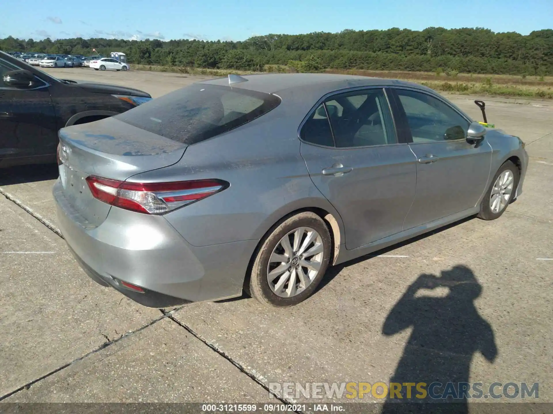 4 Photograph of a damaged car 4T1B11HKXKU850825 TOYOTA CAMRY 2019