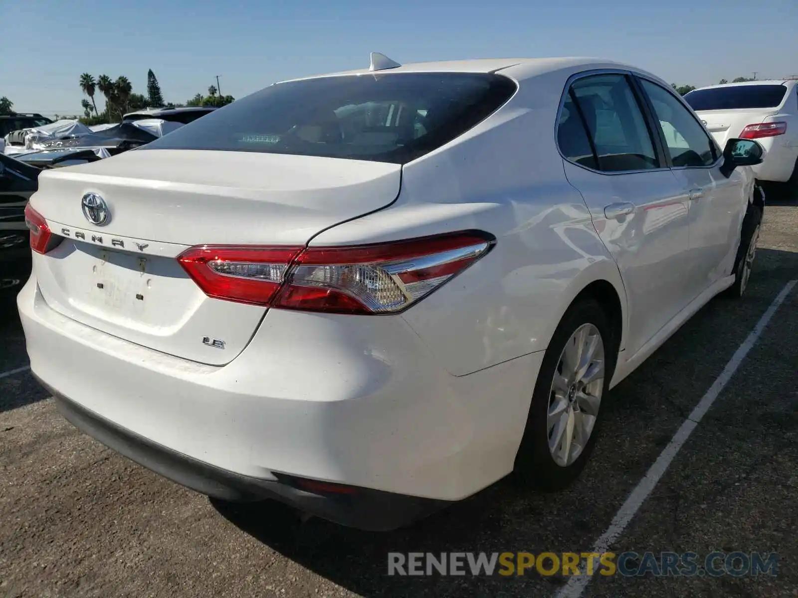 4 Photograph of a damaged car 4T1B11HKXKU852820 TOYOTA CAMRY 2019