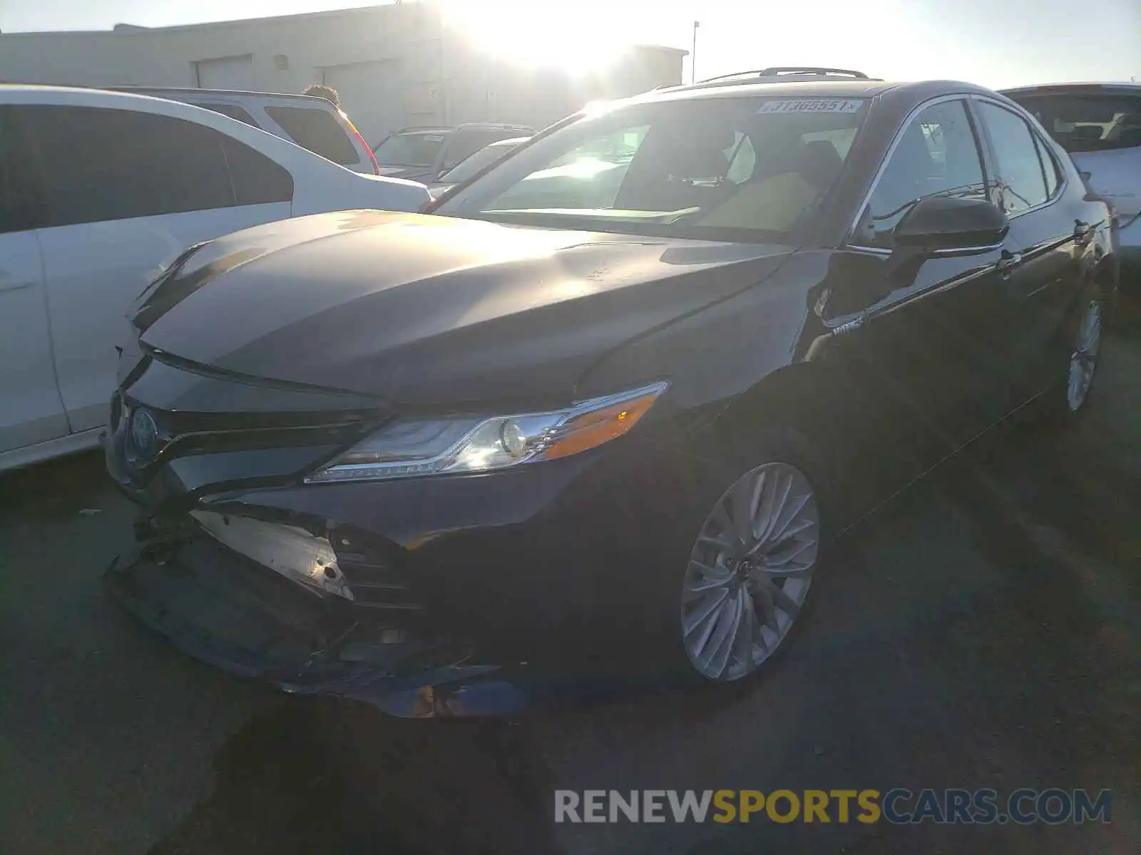 2 Photograph of a damaged car 4T1B21HK1KU013295 TOYOTA CAMRY 2019