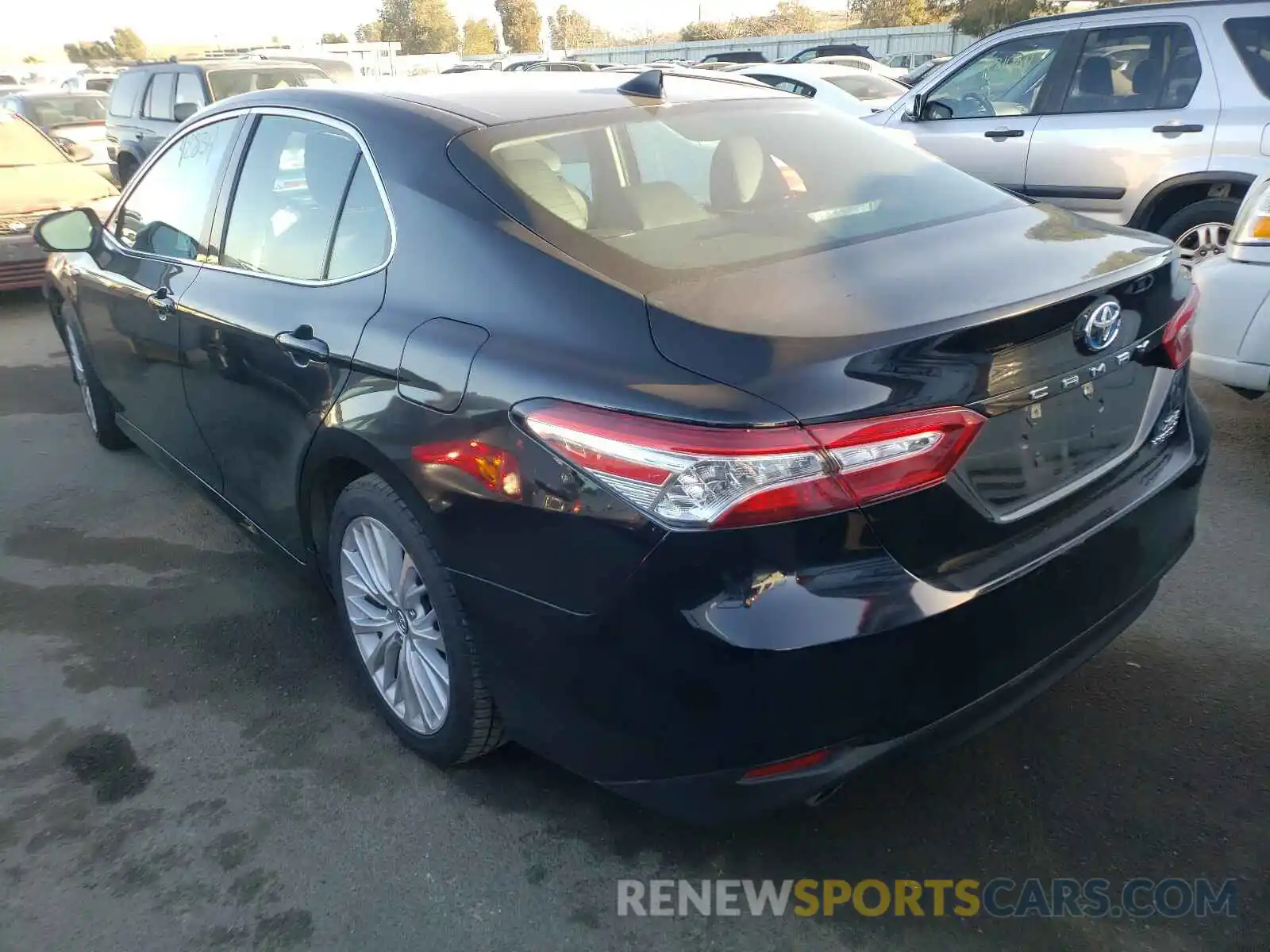 3 Photograph of a damaged car 4T1B21HK1KU013295 TOYOTA CAMRY 2019