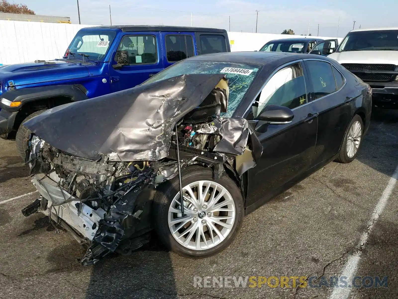 2 Photograph of a damaged car 4T1B21HK1KU514509 TOYOTA CAMRY 2019