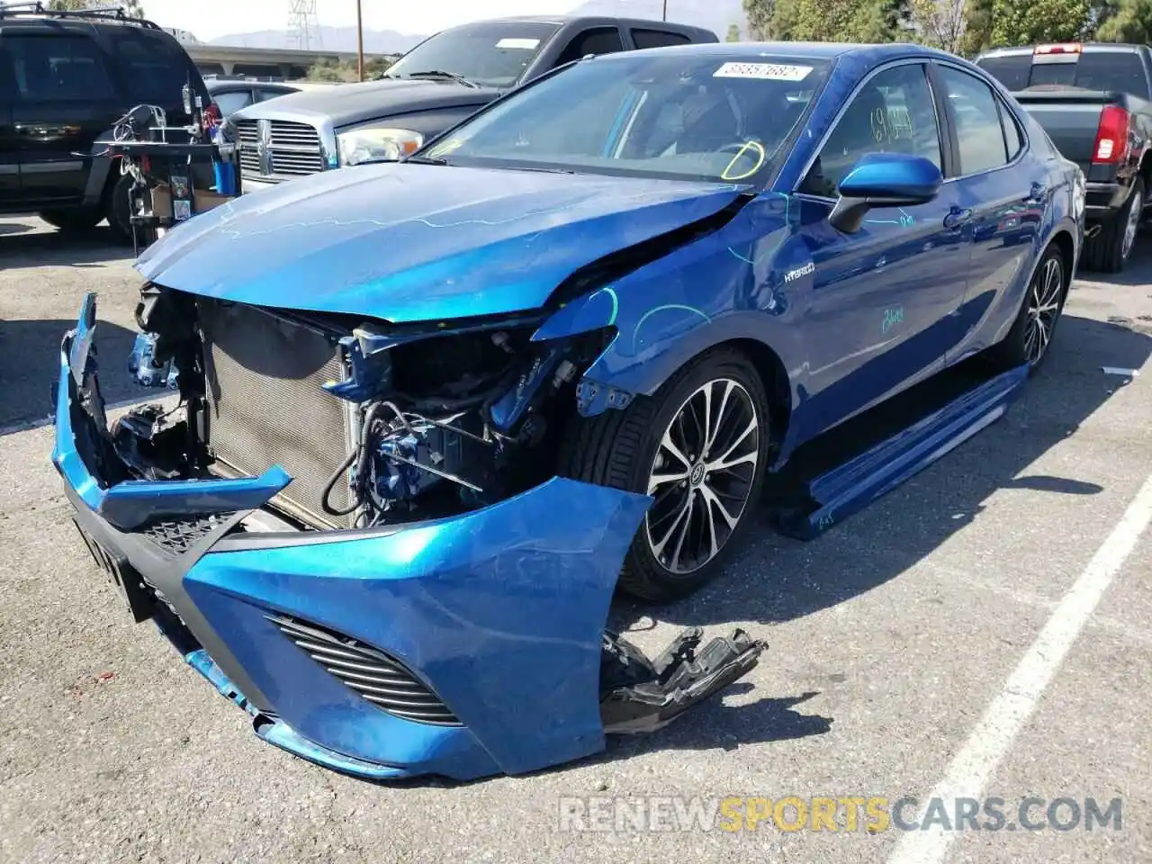 2 Photograph of a damaged car 4T1B21HK2KU009952 TOYOTA CAMRY 2019