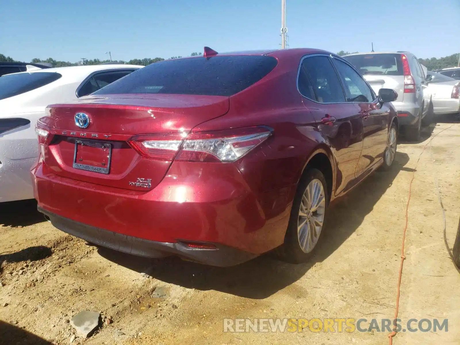 4 Photograph of a damaged car 4T1B21HK3KU512776 TOYOTA CAMRY 2019