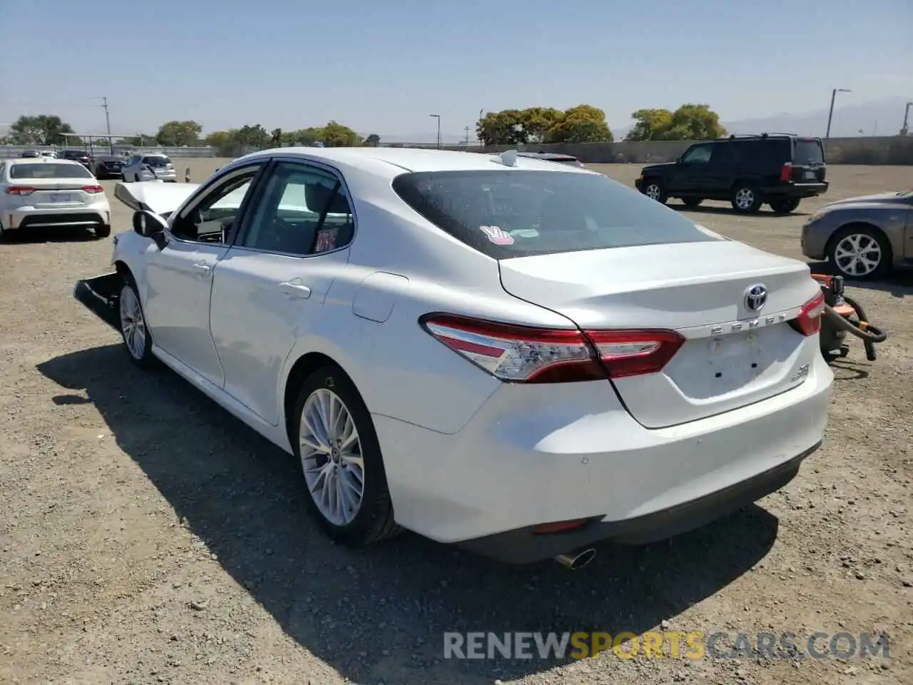 3 Photograph of a damaged car 4T1B21HK3KU521638 TOYOTA CAMRY 2019